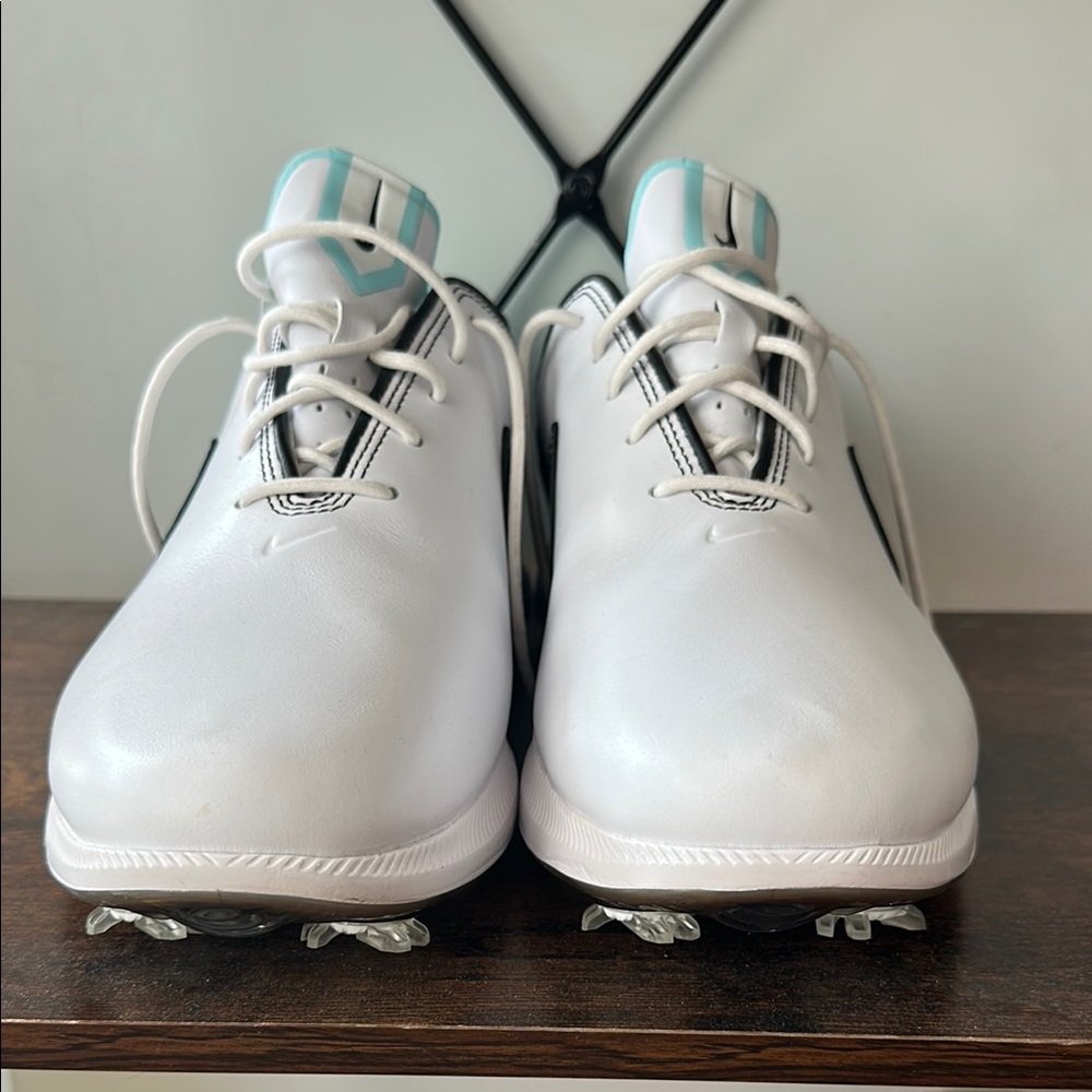 Nike White Golf Shoes with Teal Tongue Accents